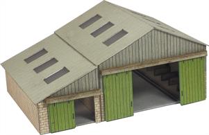 A large barn/cow shed, silo pit and 2 hen huts.