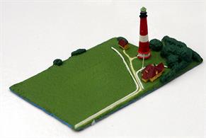 A 1/1250 model of Pellworm lighthouse on the North Friesian Island of Pellworm on the North Sea coast of Germany by Pharos Ph5. The model includes buildings and landscape.