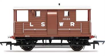 Model of the London &amp; South Western Railway later type goods train guards brake van number 10124 finished in LSWR brown livery with red ends.These 20ton 'New Vans' remained in service through the Southern Railway years with many reaching British Railways ownership at nationalisation.